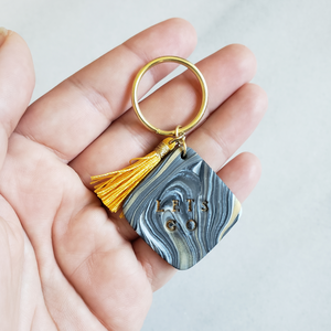 Black Marble "Lets Go" Keychain